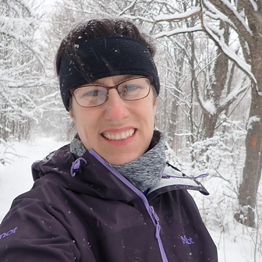 11Picture of a smiling person outdoors in the snow