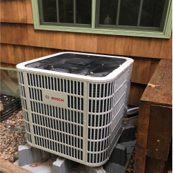 Outdoor unit for a ducted cold climate air source heat pump. It looks like a regular whole home air conditioner heat exchanger.